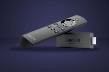 Amazon Fire TV Stick and remote, used to install IBO Player for StreamMo IPTV